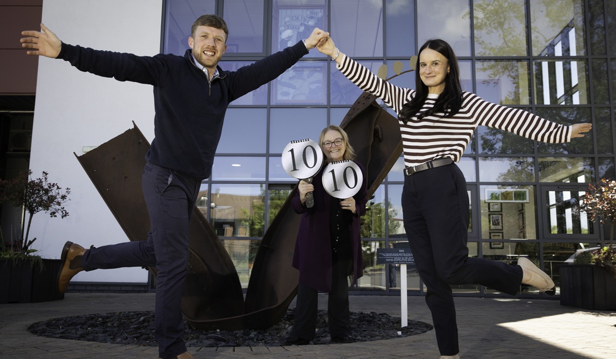 Jack Davies from Village Bakery who is taking part in a charity Strictly come dancing to raise funds for Nightingale house; Jack Davies Pictured with Kara Lindsay of Nightingale House Hospice and Tracie Edwards , Village Bakery.