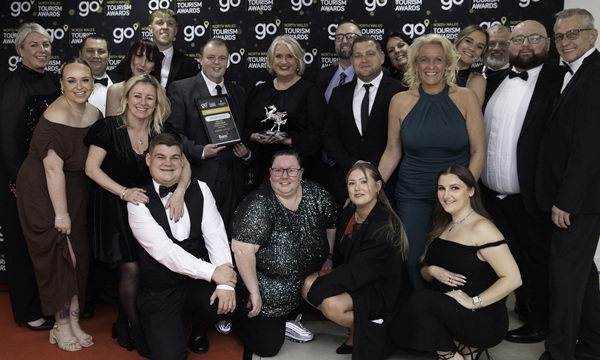 The Go North Wales Tourism Awards 2025;Bro a Byd Award for Ethical, Responsible and Sustainable Tourism sponsored by Development Bank of Wales: Hafan y Môr Holiday Park, Pwllheli; Pictured with the awards, Adam Cooke and Denise Boson.