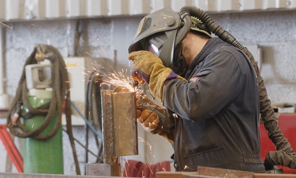 An ECI worker at Ledwood Mechanical Engineering in Pembrokeshire, Wales