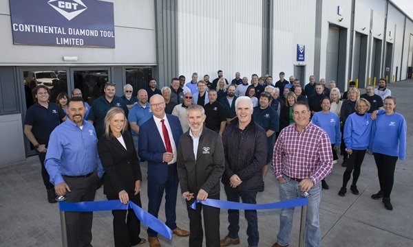 Official opening of CDT in Kinmel Bay; Pictured cutting the ribbon is Justin Hughes; Production Manager at Continental Diamond Tool Ltd Kinmel Bay with (L/R) Troy Giacherio CDT, Elen Edwards Economic development, Conwy county Borough Council, Cllr Nigel Smith, Cllr Charlie McCoubrey, Leader of Conwy Borough Council and Nick Viggiano CDT , Picture Mandy Jones