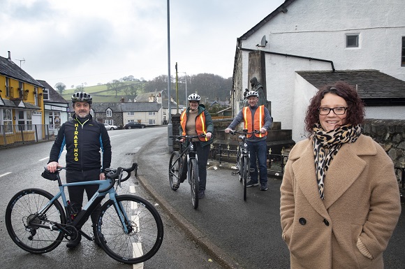 Electric Bikers Urging Others to Cash in on Wind Farm Cash