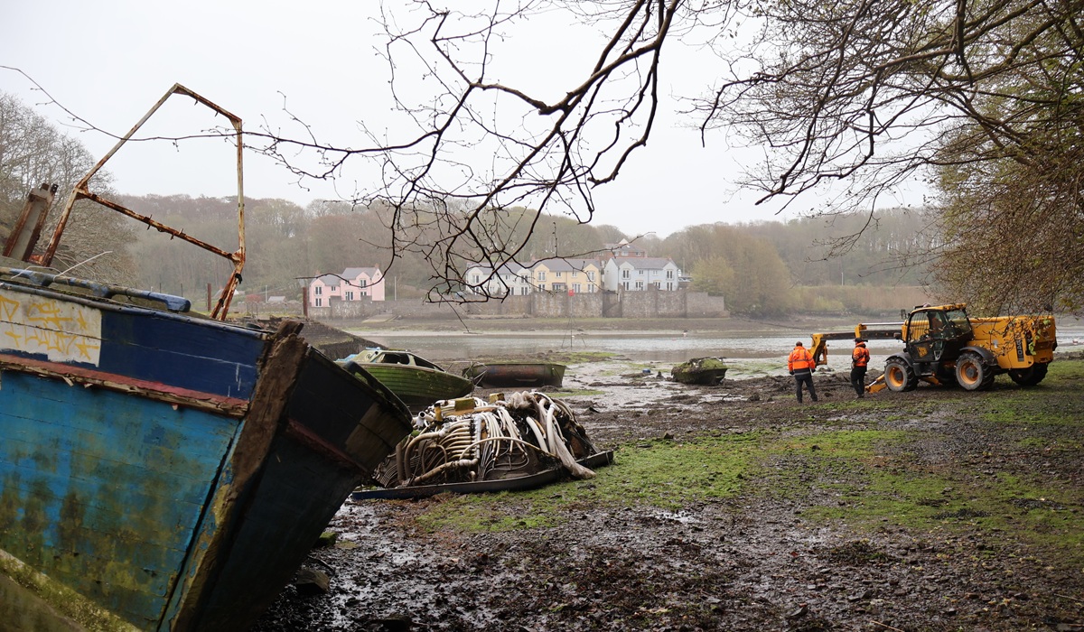Contractors (Dale Sailing) removing the derelict vessels and other items that had been fly-tipped into Castle Pill.