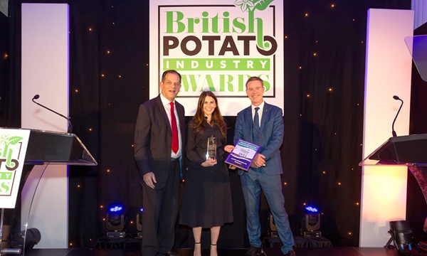 Emma Adams, head of sustainability at Puffin Produce receiving the BP Award presented by Adrian Cunnington (left) and Jamie Sutherland