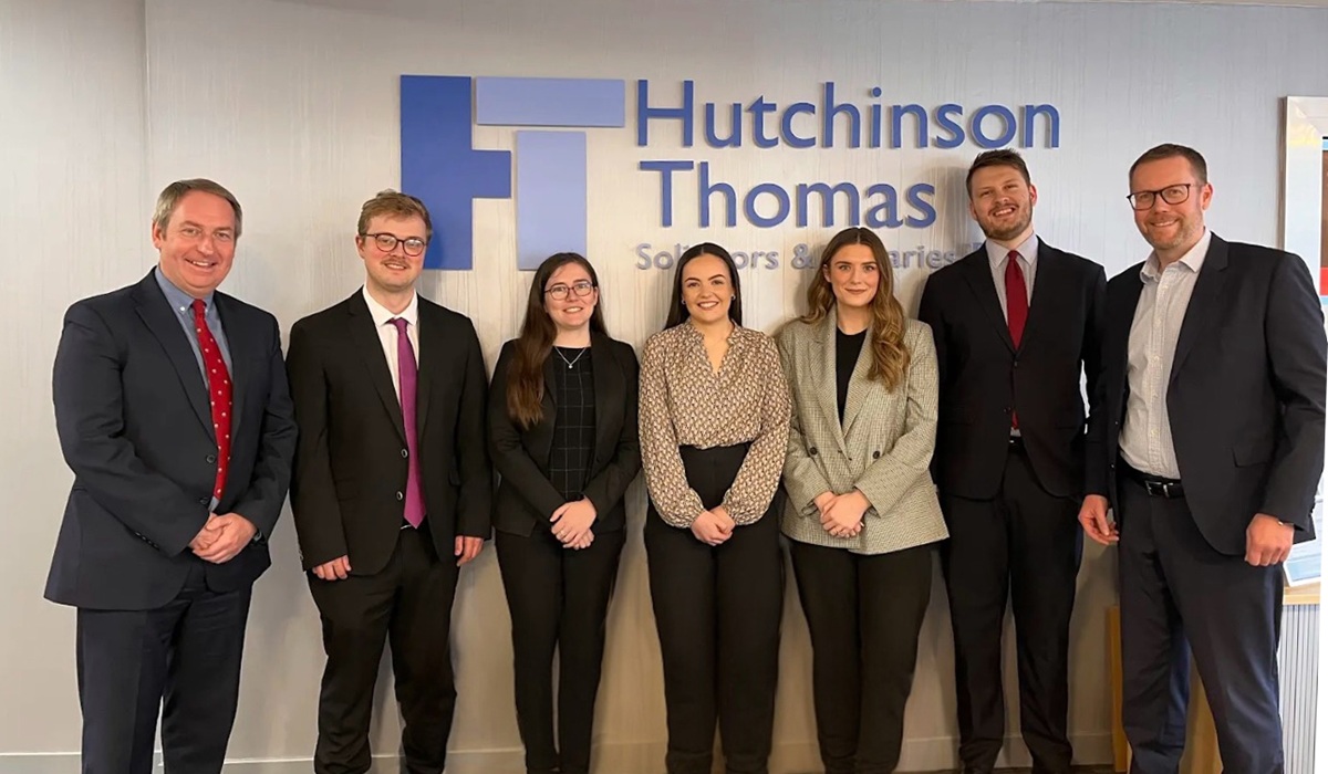 Hutchinson Thomas Solicitors Partners Simon Thomas (left) and Peter Morgan (right) with new team members