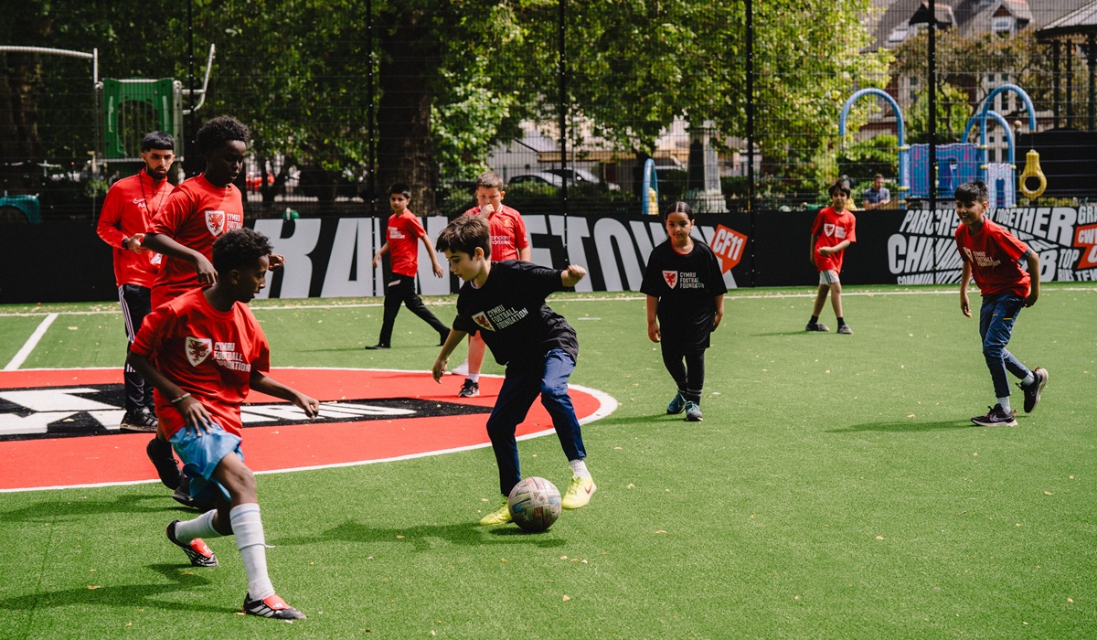 Local children playing on the new pitch credit Sophie Jordan