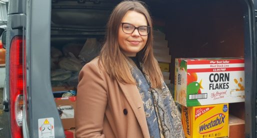 Neath Van Firm Delivers Food to Those in Need